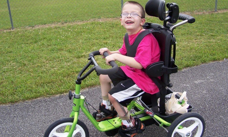 From the winner of a Parent: Judd, received his Rifton tricycle that he won through your bike giveaway. He loves it so much. His first time out with it , he pedaled .75 miles! Everyone at the track had a smile on their faces watching him enjoy his bike. The biggest smile there belonged to him though.